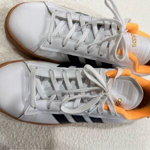 adidas White Sneakers with Black Stripes and Orange Accents
